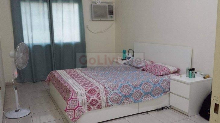 IKEA bed with side tables and cupboard