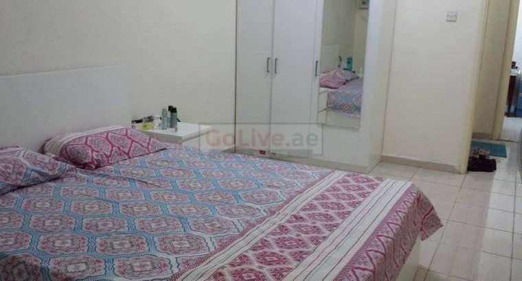 IKEA bed with side tables and cupboard