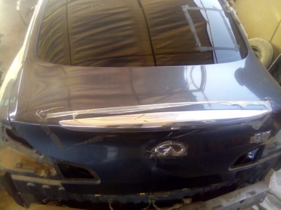 INFINITI G37 G25 SEDAN 2009 TO 2013 REAR TRUNK DOOR OEM ( Genuine Used Infiniti Parts )