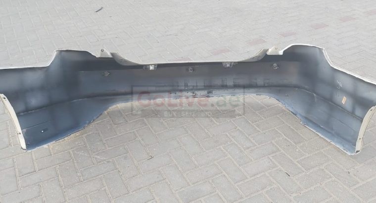 FORD FUSION 2010 TO 2012 REAR BUMPER PART NO AE5317D781CCBW ( FORD GENIUNE USED PARTS )
