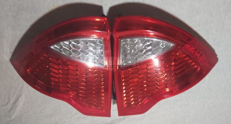 FORD FUSION 2010 TO 2012 TAIL LIGHTS RIGHT & LEFT PART NOS 9E5313B504A/9E5313B505A ( FORD GENUINE USED PARTS )