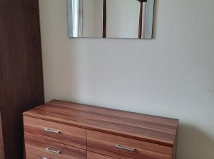 Chest of drawers and mirror
