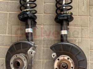VOLKSWAGEN PASSAT 2009 2010 2011 FRONT RIGHT AND LEFT SHOCK ABSORBERS AND BEARING HUBS ( Genuine Used VOLKSWAGEN Parts )