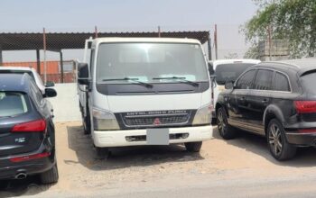 MITSUBISHI CANTER RECOVERY BUYER IN SHARJAH INDUSTRIAL ( USED COMMERCIAL VEHICLE BUYER IN SHARJAH INDUSTRIAL )