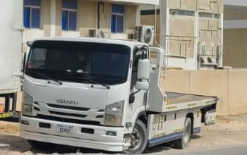 ISUZU NPR RECOVERY PICKUP BUYER IN DUBAI INDUSTRIAL CITY ( USED COMMERCIAL VEHICLE BUYER IN DIC DUBAI )