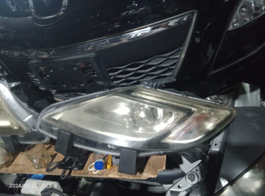 Mazda CX-9 headlights and other body parts available for sale