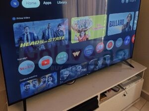 TCL 65-Inch LCD TV with Table – Excellent Condition