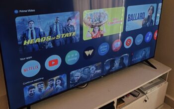 TCL 65-Inch LCD TV with Table – Excellent Condition