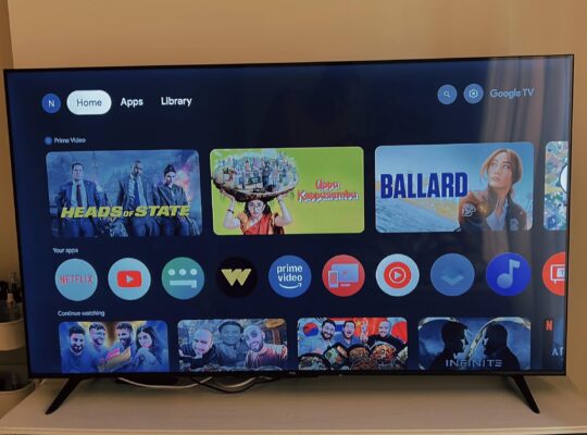 TCL 65-Inch LCD TV with Table – Excellent Condition