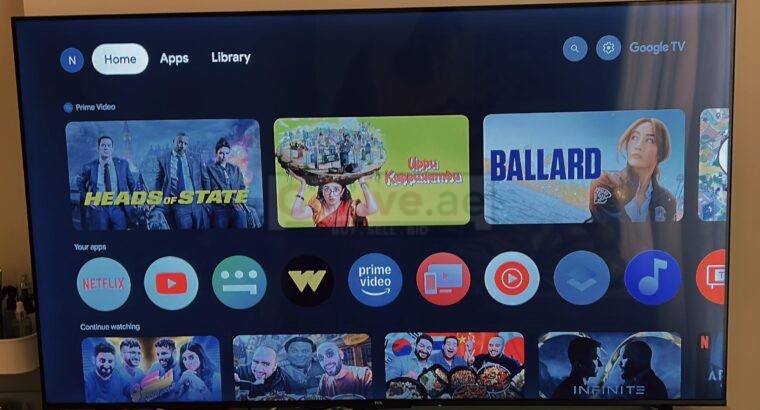 TCL 65-Inch LCD TV with Table – Excellent Condition